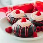 Chocolate doughnuts with berries